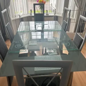 Glass top dining table with 6 chairs