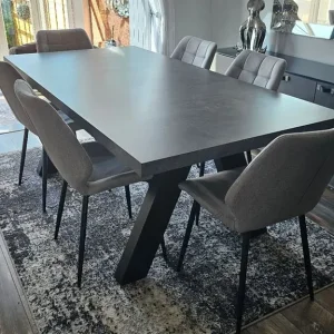 Concrete grey and black dining table with 6 grey chairs