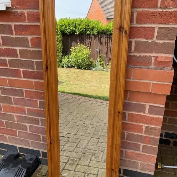 Full length mirror with pine surround