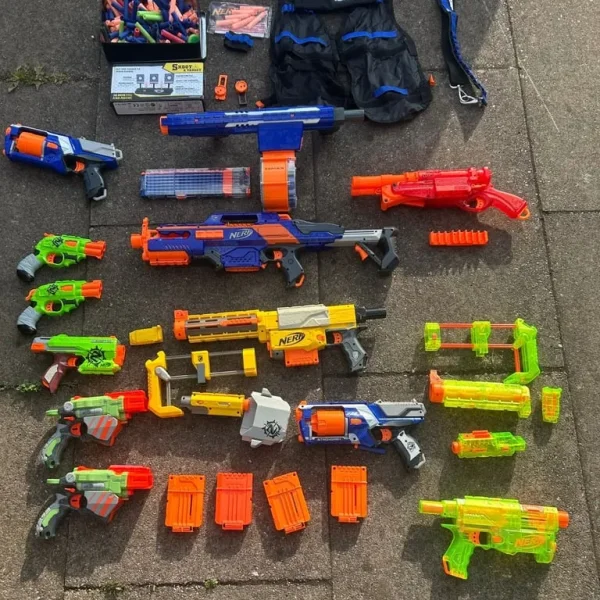 Nerf Guns, large collection of 12 with pellets and other accessories