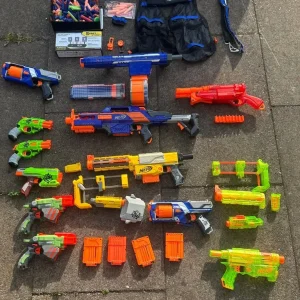 Nerf Guns, large collection of 12 with pellets and other accessories