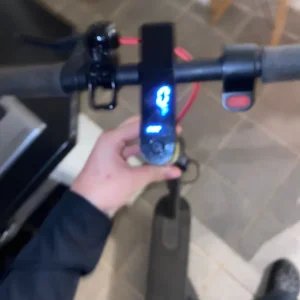 Electric scooter with charger - Image 2