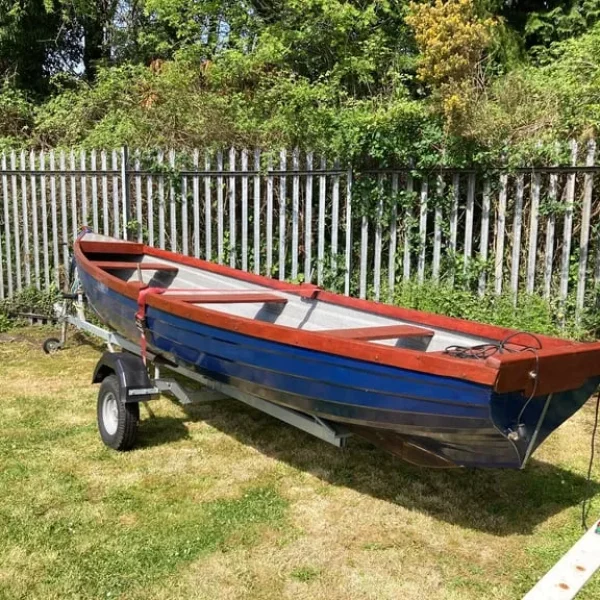 19’ open fishing boat with new trailer and 12hp Honda engine
