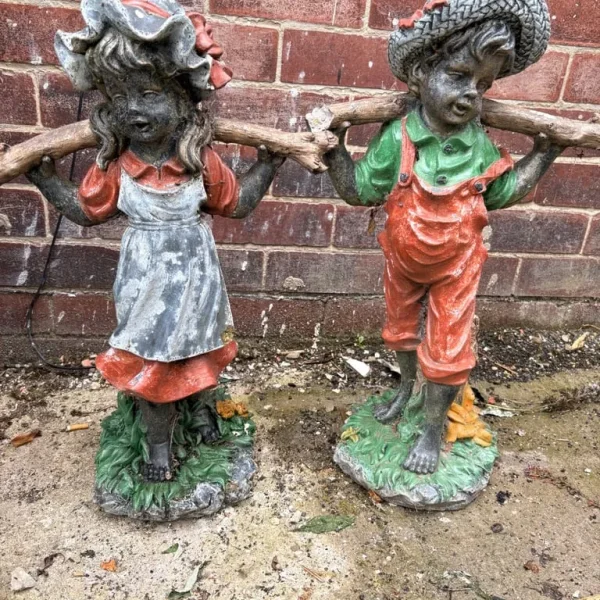 Garden girl and boy statue