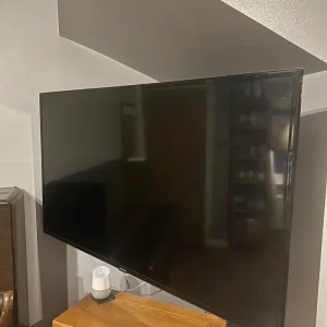 55’’ Flat Screen Samsung TV with BlueRay, DVD, and Surround Sound