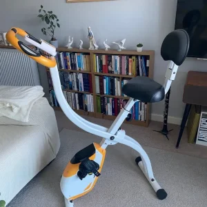 Folding Indoor Exercise Bike – Yellow, Smooth, and Easy to Store - Image 3
