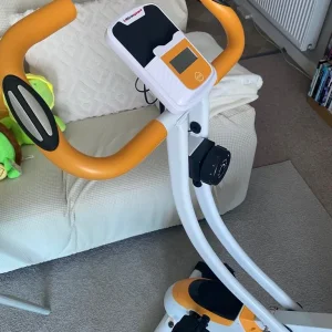 Folding Indoor Exercise Bike – Yellow, Smooth, and Easy to Store - Image 4