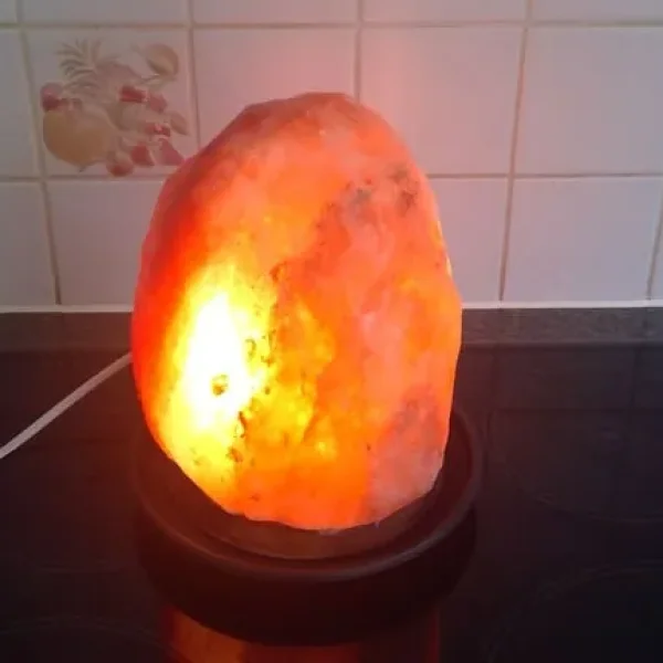 Himalayan Salt Lamp On Wooden Stand