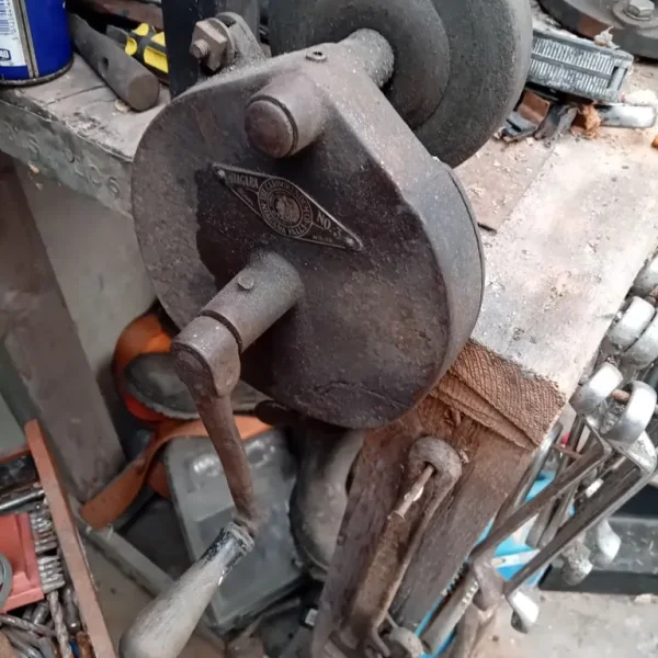 Vintage hand cranked bench grinder