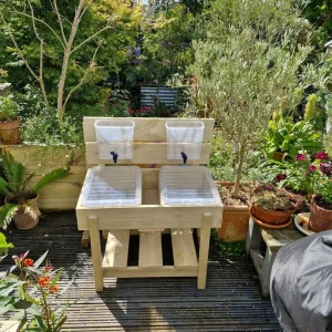 Multi-play table with two water tanks