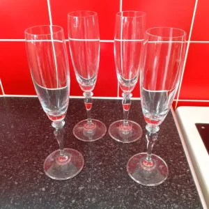 4 champagne glasses Never been used