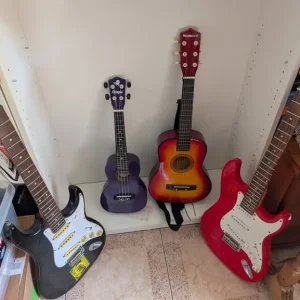 Selection of guitars including Benson electric, old Encore, and acoustic models - Image 2