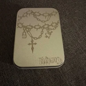 Named Collective zipper refillable lighter