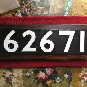 cast iron plate mounted for display
