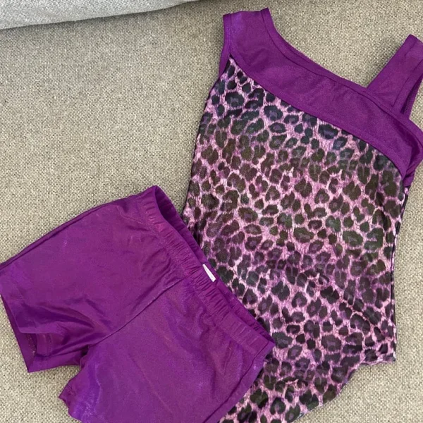 Girls gymnastics leotard and matching shorts. Aged 7-8