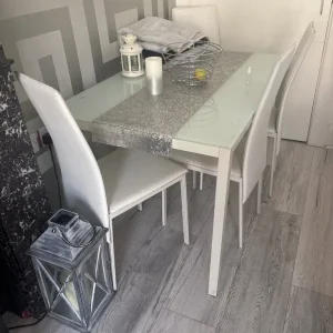 White leather dining table and chairs set