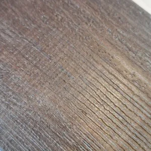 Dark brown textured flooring - Image 3