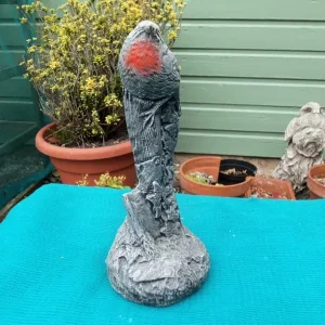 Robin concrete statue