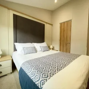 3-bedroom static lodge with wrap-around deck on the beach - Image 4