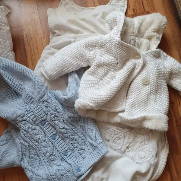 Baby sleeping bag and two cardigans