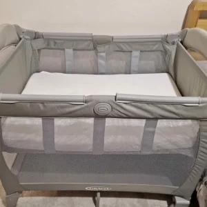 Graco travel cot with mesh sides and sturdy build - Image 8