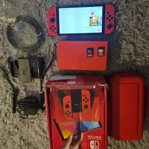 Nintendo Switch OLED Red Mario Edition with 2 games