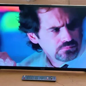32 inches Sharp Smart TV with remote and stand - Image 4