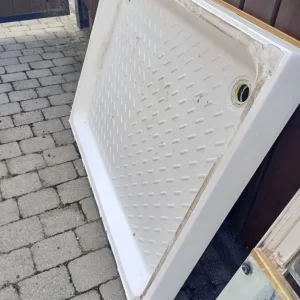 Shower enclosure and tray