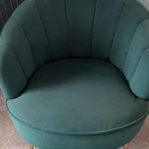 Dark green armchair