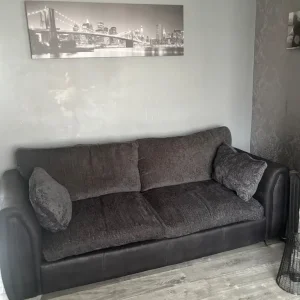 Black and grey sofa and chair