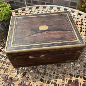 Antique sewing or jewellery box with brass details