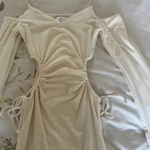 Oh polly Ruched Cut Out Sides Long Sleeves Ivory Mini Dress - Image 2