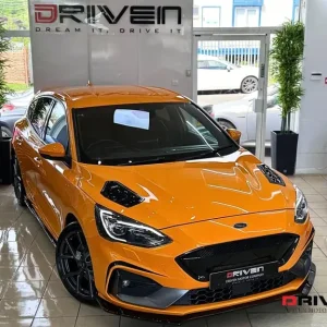 2019 Ford Focus ST 2.3 EcoBoost 5-door with splitter kit and orange wheels - Image 2