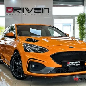 2019 Ford Focus ST 2.3 EcoBoost 5-door with splitter kit and orange wheels