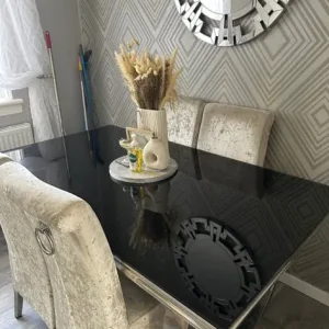 Glass dining table and 4 silver chairs