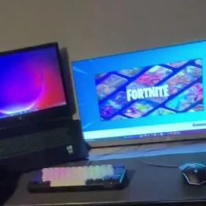 Gaming laptop with monitor, keyboard, and mouse