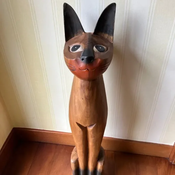 Wooden cat sculpture