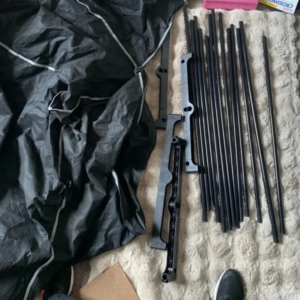 Black clothes rail with cover