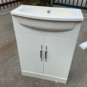 White gloss vanity unit and basin