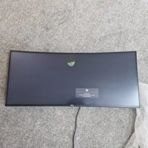 Dell UltraSharp U3821DW 38 inch curved monitor with a small screen scratch