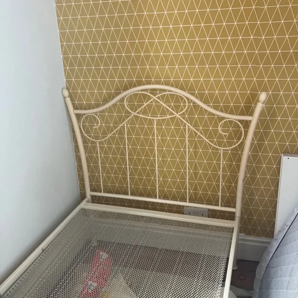 Single metal framed bed