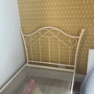 Single metal framed bed