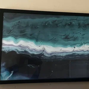 Calming blue photo in black wooden frame