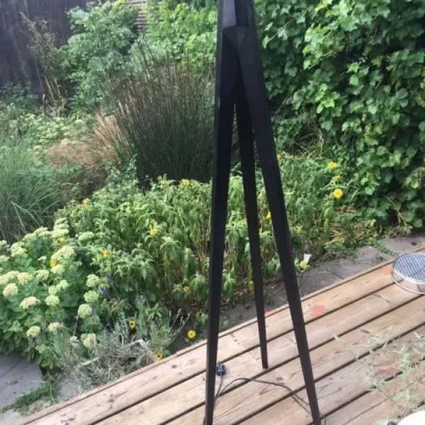 Tall black wood lamp stand with tripod base