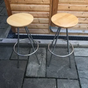 Two identical tubular metal framed stools with round wooden seats - Image 2