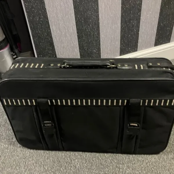 Suitcase with wheels and pull handle