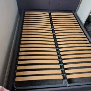 Grey material double bed