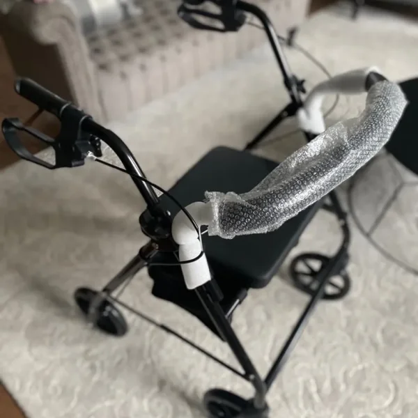 Walking aid with storage seat