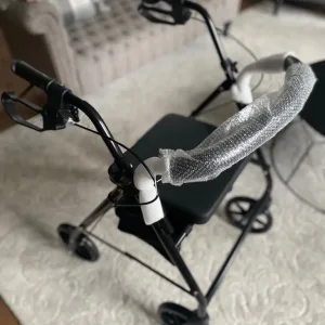 Walking aid with storage seat