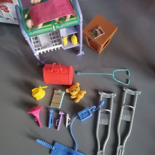 Barbie bundle with ambulance, dentist, and baby doctor sets